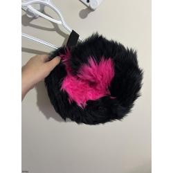 Curly pink dog tail and ears