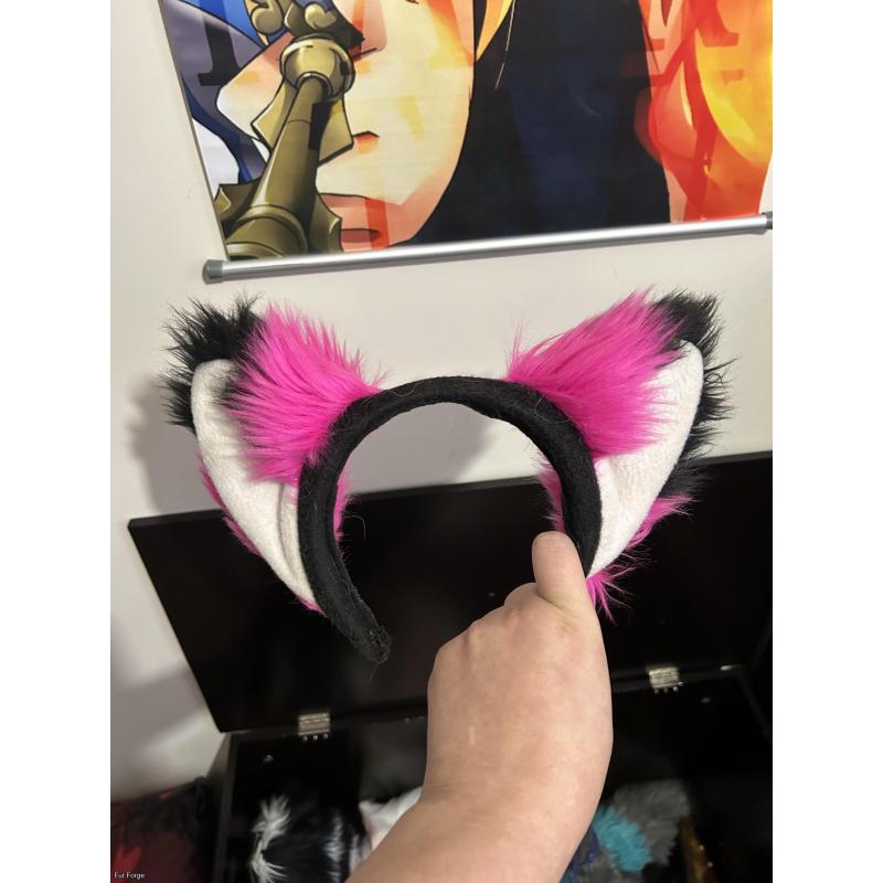 Curly pink dog tail and ears